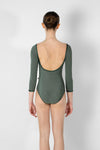 Adult model wearing green 3/4 sleeve leotard shown from the back.
