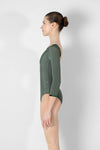 Adult model wearing green 3/4 sleeve leotard shown from the side.
