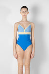 Model wearing blue and yellow camisole leotard front view