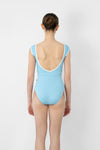 Adult model wearing a light blue cap sleeve leotard, shown from the back.