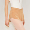 Adult ballet dancer wearing a tan pull-on ballet skirt over a leotard