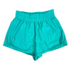 Jade green flowy dance shorts laid flat.