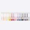 Group display of multiple miniature pointe shoe key chains in assorted colors