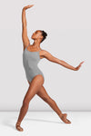 Dancer wearing grey camisole leotard in dance pose