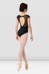 Back view of a black Bloch leotard featuring an open back and cap sleeves worn with ballet tights