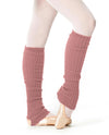 Dusty rose knit leg warmers styled over ballet shoes.