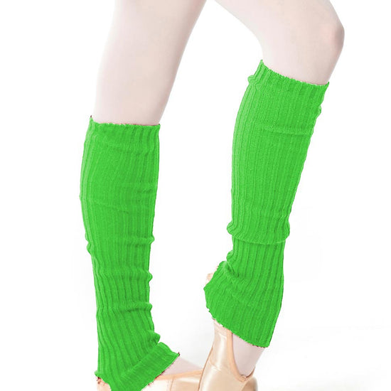 Bright green long knit leg warmers over tights.