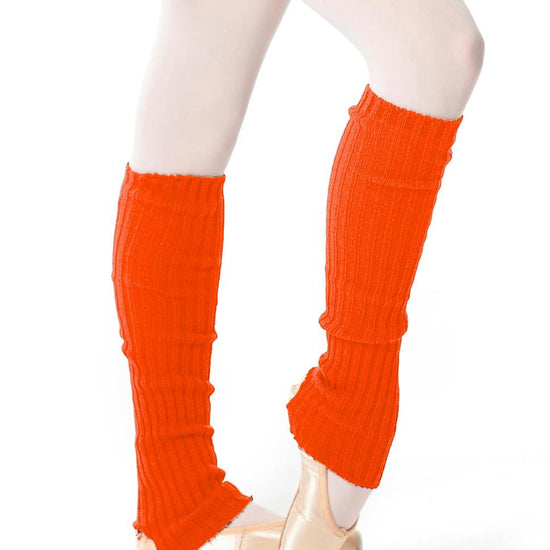 Fluorescent orange long knit leg warmers over tights.