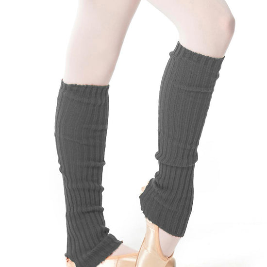 Gray 60 cm knit leg warmers worn over tights and ballet slippers.