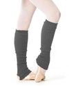 Gray 60 cm knit leg warmers worn over tights and ballet slippers.