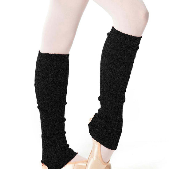 Metallic black knit leg warmers worn over tights.