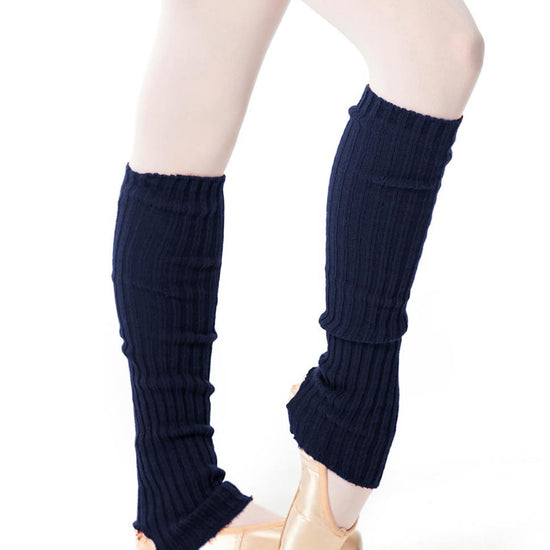 Navy knit leg warmers worn over tights and ballet shoes.