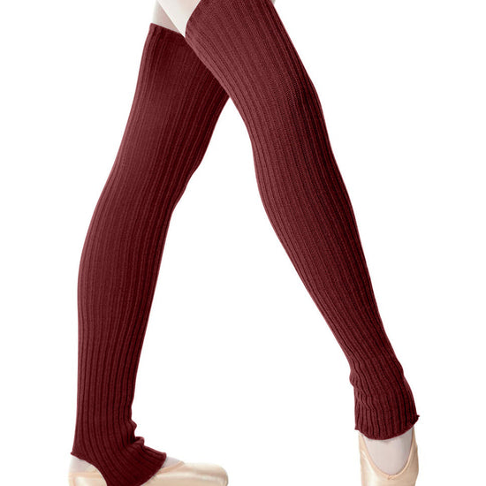 Burgundy stirrup knit dance leg warmers worn over ballet tights