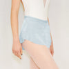 Adult ballet dancer wearing a light aqua pull-on ballet skirt over a leotard