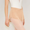 Adult ballet dancer wearing a peach pull-on ballet skirt over a leotard