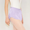 Adult ballet dancer wearing a lavender pull-on ballet skirt over a leotard