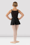 Girl wearing black skirted camisole leotard back view