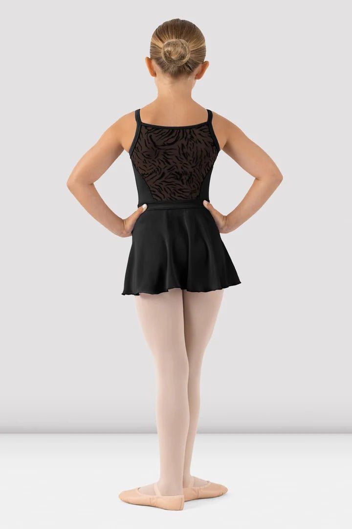 Girl wearing black skirted camisole leotard back view