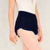 Adult ballet dancer wearing a navy pull-on ballet skirt over a leotard