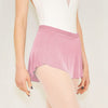 Adult ballet dancer wearing a light pink pull-on ballet skirt over a leotard