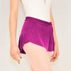 Adult ballet dancer wearing a magenta pull-on ballet skirt over a leotard