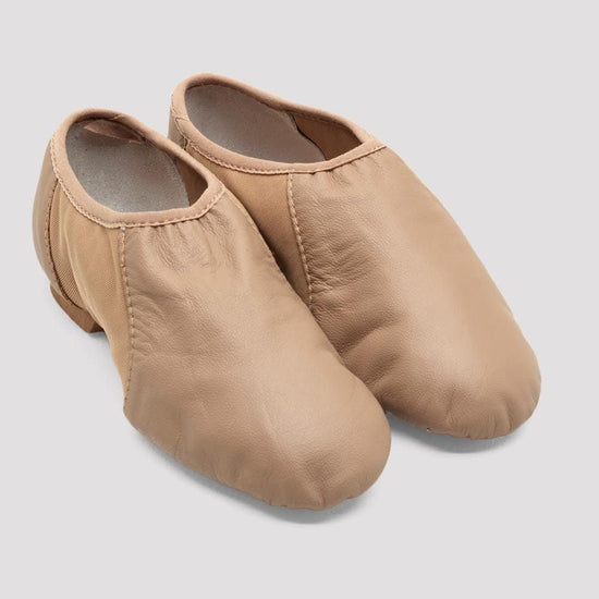 Tan slip-on leather jazz shoes shown as a pair on a white background.
