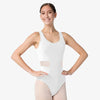Model wearing white tank leotard with mesh insert detail
