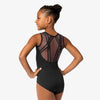 Back view of child wearing black tank leotard with mesh insert and strap detailing