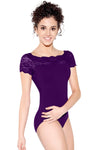 Dancer wearing a purple cap sleeve lace neckline leotard