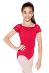 Child wearing red lace cap sleeve leotard in standing pose.