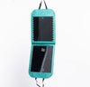 Teal LED folding mirror with illuminated lights, shown hanging vertically.