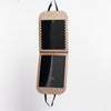 Rose gold LED folding mirror shown open with two reflective panels and hanging strap.