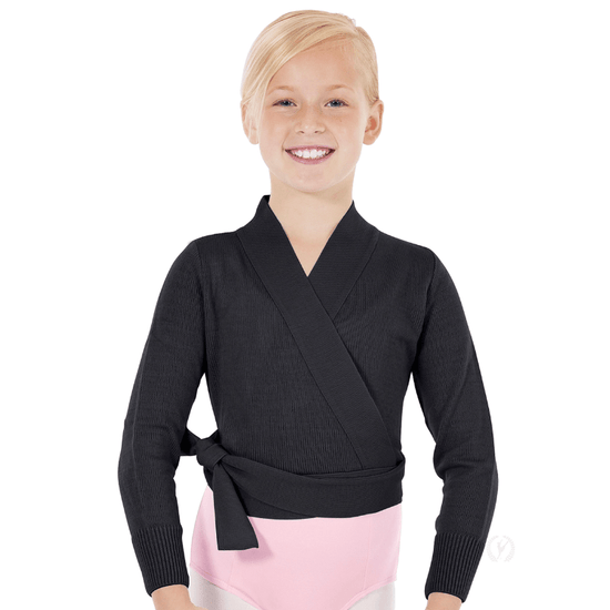 Young dancer wearing a black long sleeve wrap ballet sweater tied at the waist