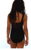 Back view of a black child tank leotard with wide mesh straps.