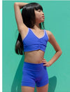 Lavender cropped dance top worn by a dancer with matching shorts