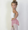 Young dancer wearing pink pull-on ballet skirt