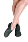 Dancer wearing black slip-on jazz shoes with flexible sole
