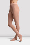 Child dancer wearing darker tan footed ballet tights standing in ballet stance