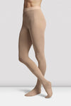 Child dancer wearing beige footed ballet tights