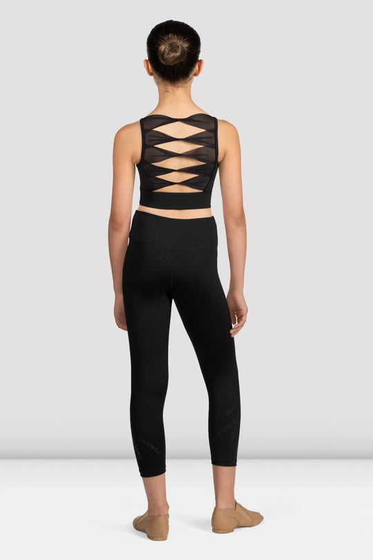 Back view of child dance crop top showing mesh twist-back detail
