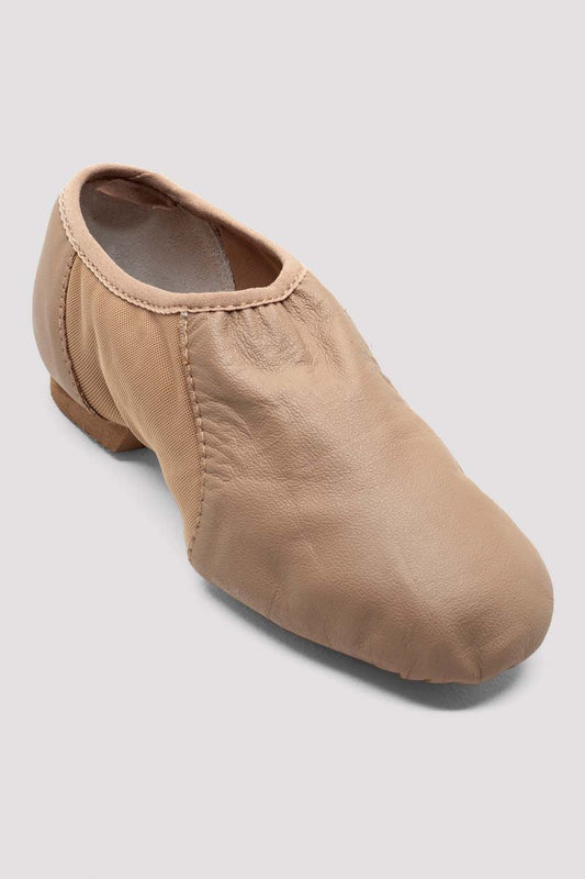 Single tan slip-on leather jazz shoe angled slightly to the side on a white background.