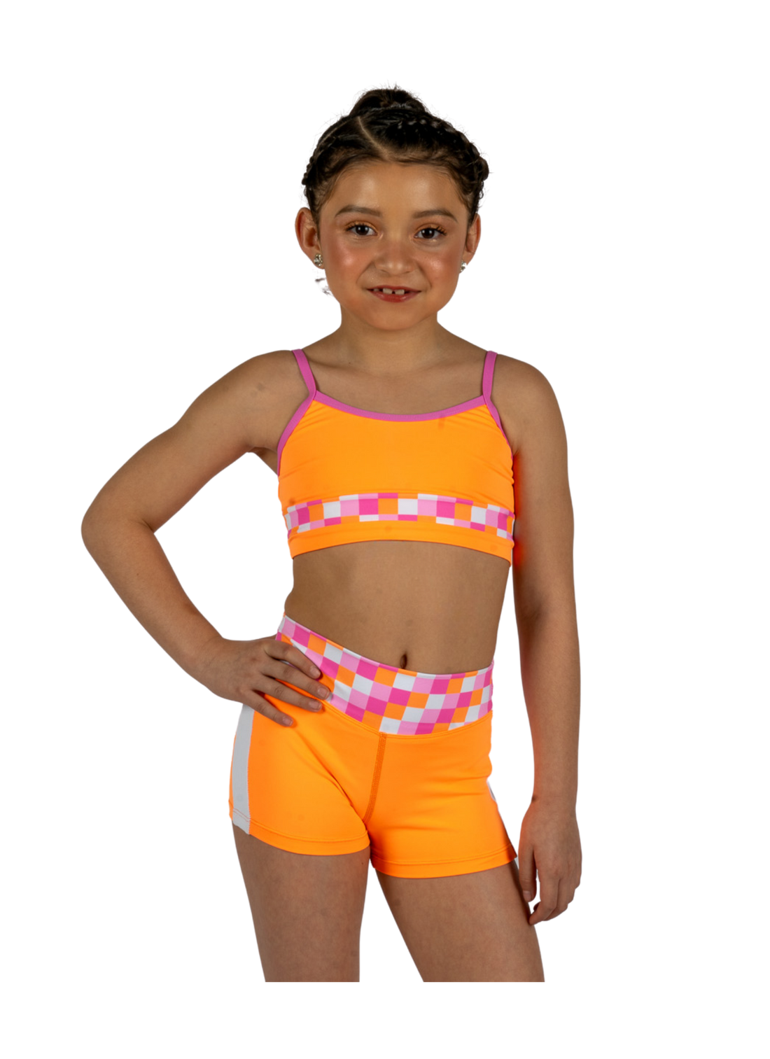 Dancer wearing an orange XO Dance Co crop top with matching shorts