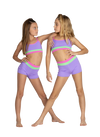 Two young dancers wearing lavender and pink colorblock crop dance tops with matching bottoms