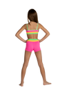 Young dancer wearing a bright pink and coral crop dance top with matching bottoms