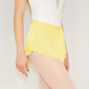 Adult ballet dancer wearing a yellow pull-on ballet skirt over a leotard
