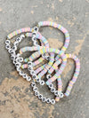 Days of the week beaded bracelet set arranged together