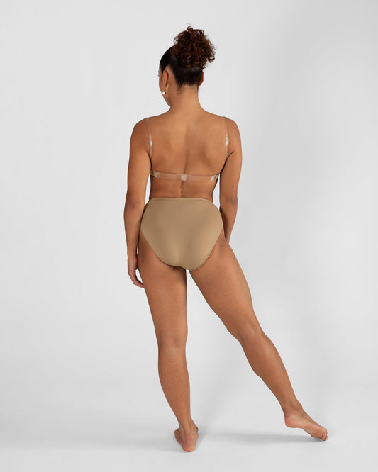 Model wearing a nude high cut dance brief with matching bra, back view