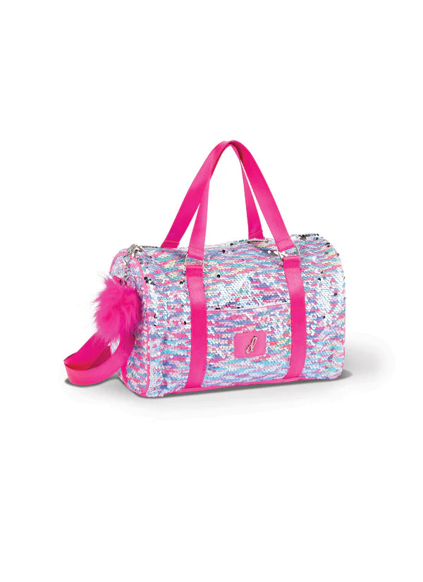 Silver and pink sequin dance duffel bag with bright pink straps and pom accessory