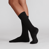 Silky Dance compression turning sock shown from side view in black