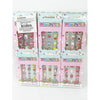 Full view of several kids press-on nail packs arranged side by side